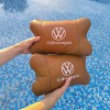 Набір подушок 2шт для автомобіля Volkswagen, з натуральної коричневої шкіри. Подушки на підголовник